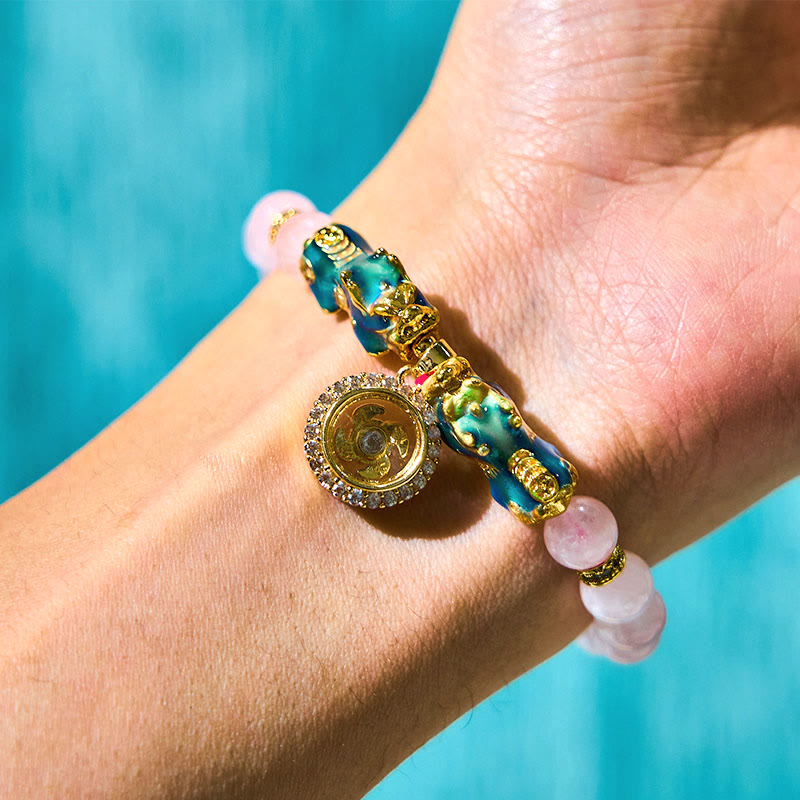 Braccialetto con ciondolo a forma di ciclone PiXiu Buddha Stones e cristallo rosa che cambia colore