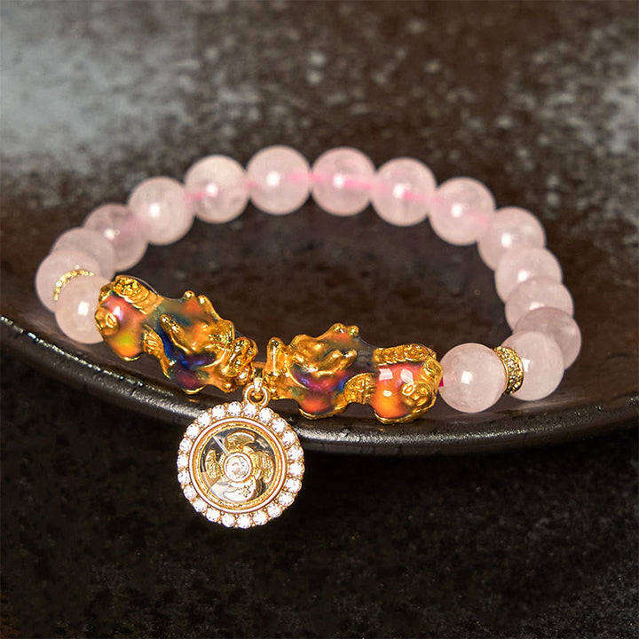Braccialetto con ciondolo a forma di ciclone PiXiu Buddha Stones e cristallo rosa che cambia colore