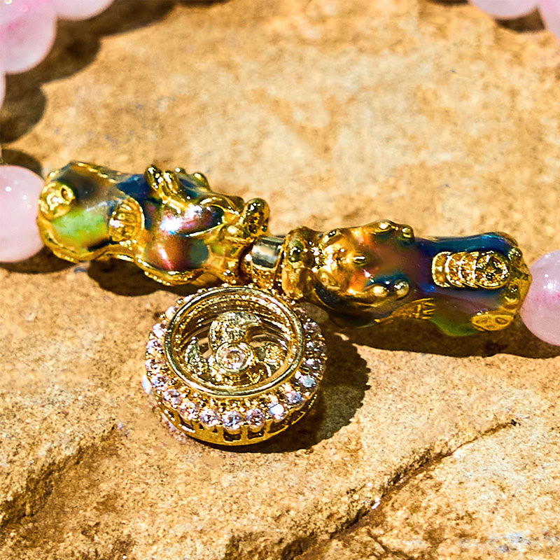 Braccialetto con ciondolo a forma di ciclone PiXiu Buddha Stones e cristallo rosa che cambia colore