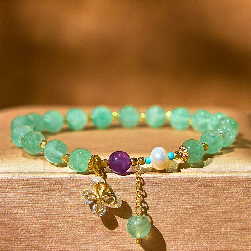Braccialetto con ciondolo a farfalla in quarzo fragola verde con Buddha Stones e quarzo fragola naturale