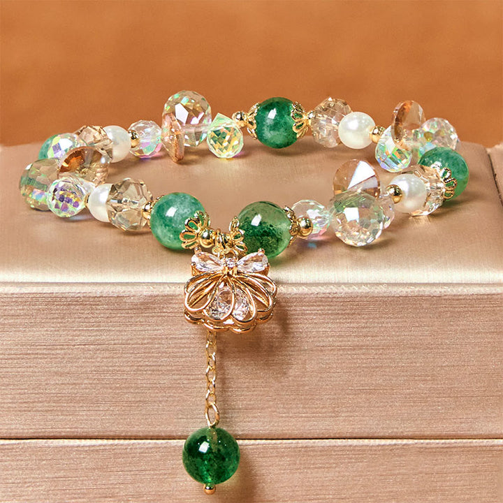 Braccialetto positivo in perle di quarzo fragola naturale Buddha Stones