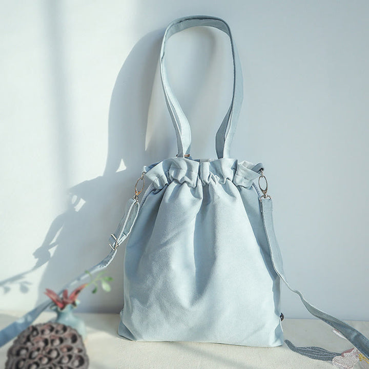 Borsa a tracolla in tela Epiphyllum verde pera blu ricamata con Buddha Stones