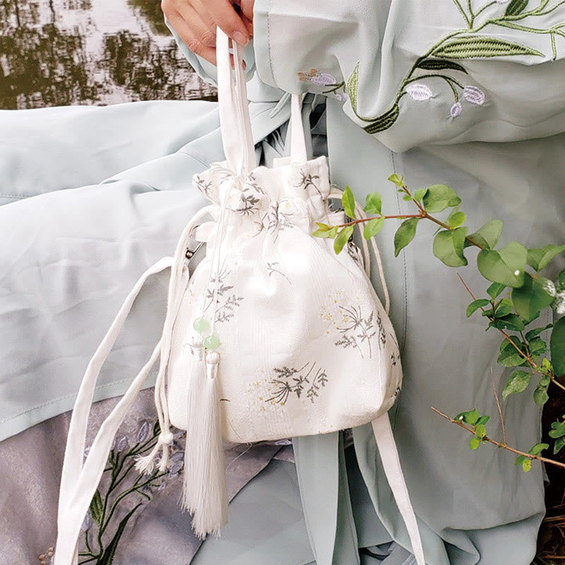 Borsa a tracolla in tela con fiori bianchi e foglie verdi, motivo Buddha Stones