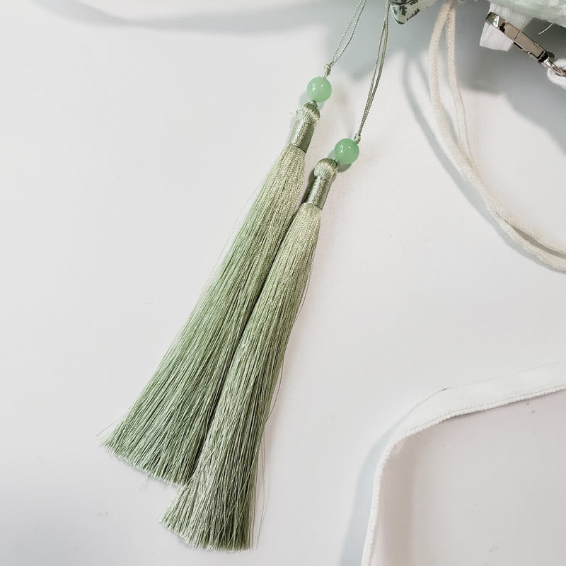 Borsa a tracolla in tela con fiori bianchi e foglie verdi, motivo Buddha Stones