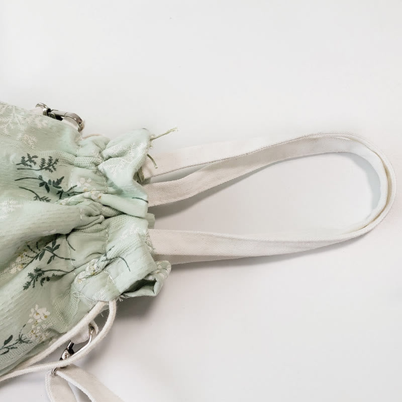 Borsa a tracolla in tela con fiori bianchi e foglie verdi, motivo Buddha Stones