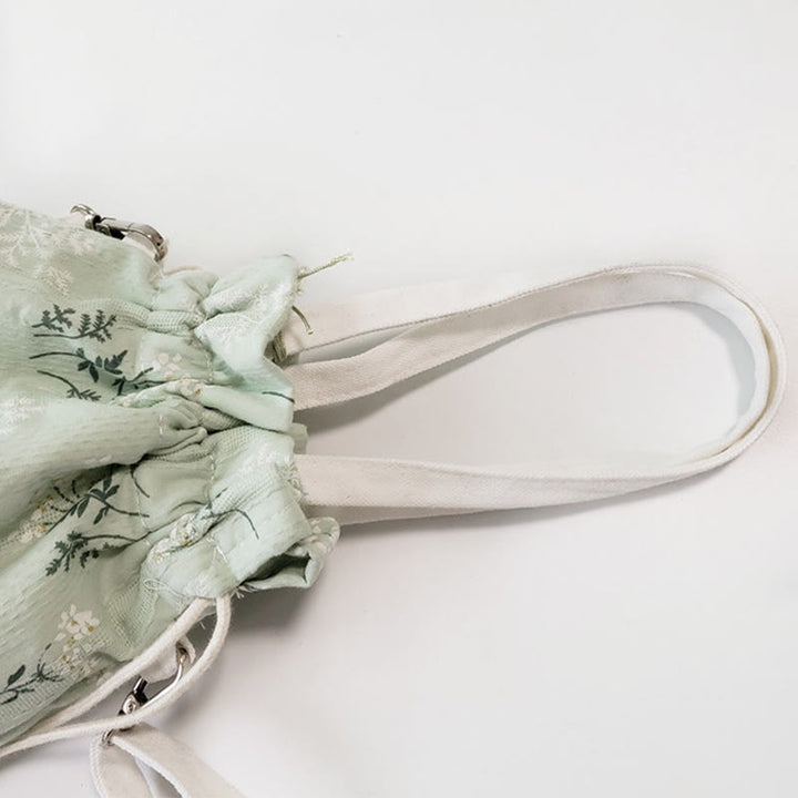 Borsa a tracolla in tela con fiori bianchi e foglie verdi, motivo Buddha Stones