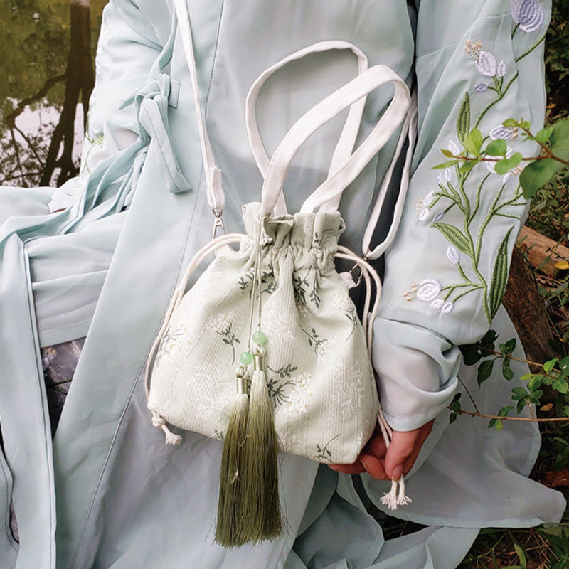 Borsa a tracolla in tela con fiori bianchi e foglie verdi, motivo Buddha Stones