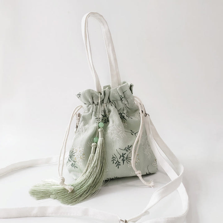 Borsa a tracolla in tela con fiori bianchi e foglie verdi, motivo Buddha Stones