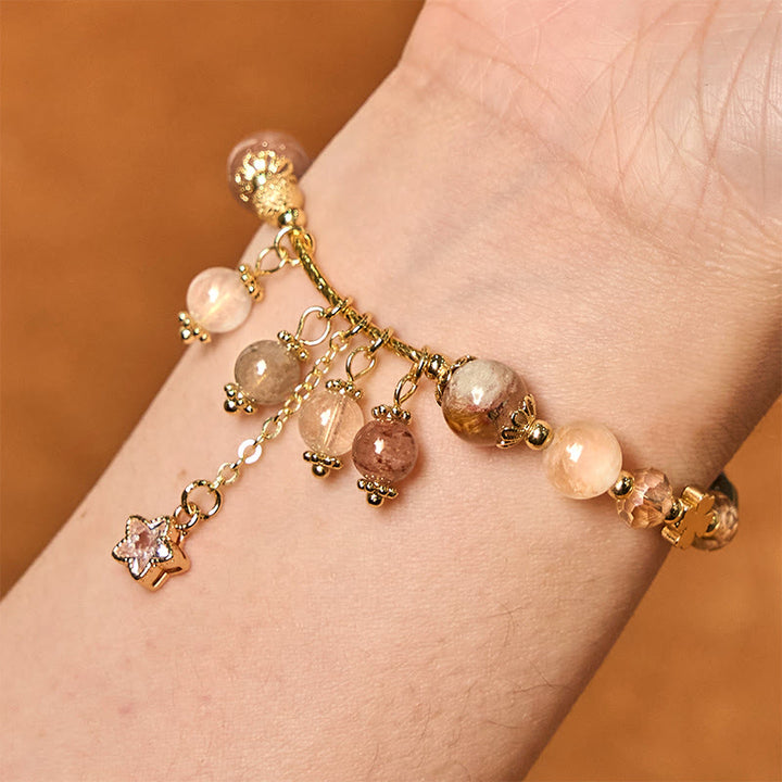 Braccialetto di auspicio con stelle a quadrifoglio e quarzo rutilato giallo colorato naturale di Buddha Stones