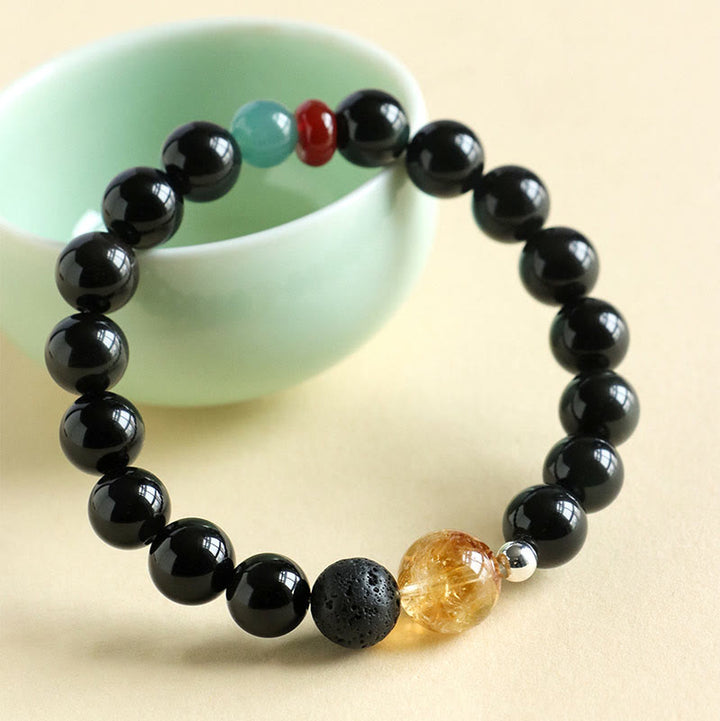 Bracciale Buddha Stones con perle di ossidiana nera naturale e forza di realizzazione