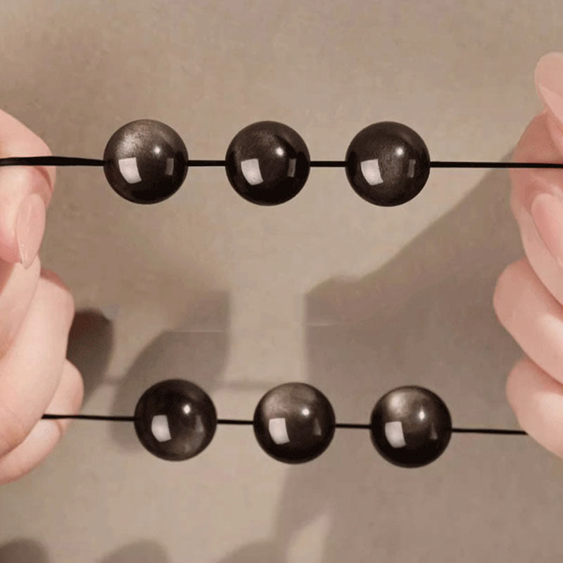 Bracciale di protezione Om Mani Padme Hum in ossidiana naturale lucida e argento Buddha Stones