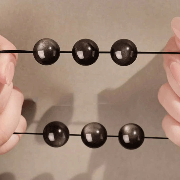 Bracciale di protezione Om Mani Padme Hum in ossidiana naturale lucida e argento Buddha Stones