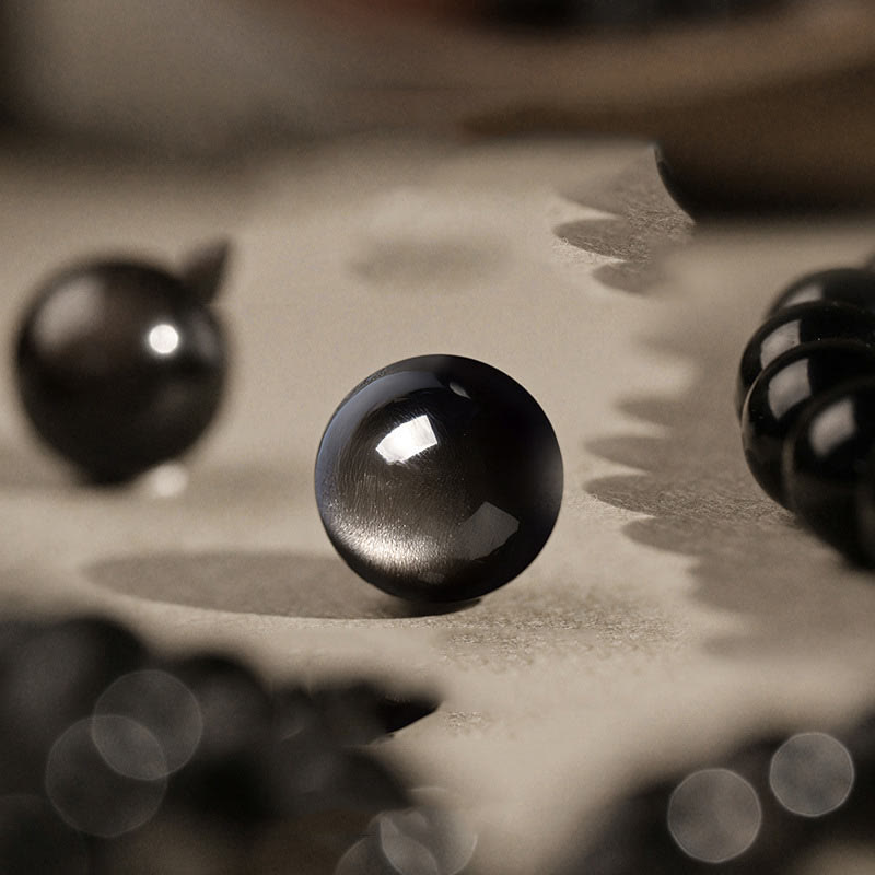 Bracciale di protezione Om Mani Padme Hum in ossidiana naturale lucida e argento Buddha Stones