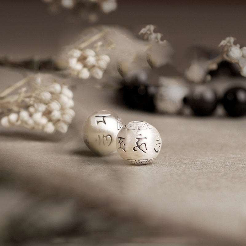 Bracciale di protezione Om Mani Padme Hum in ossidiana naturale lucida e argento Buddha Stones