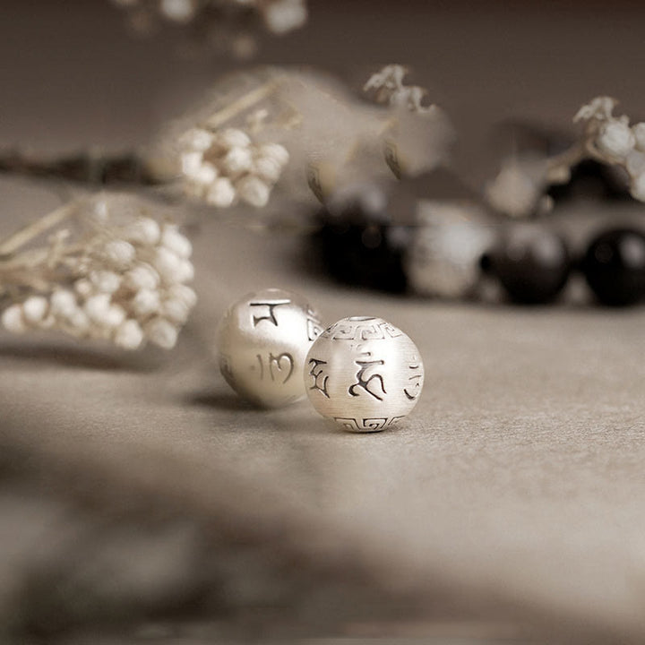 Bracciale di protezione Om Mani Padme Hum in ossidiana naturale lucida e argento Buddha Stones