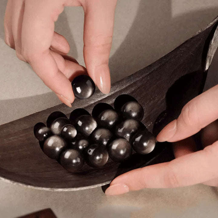 Bracciale di protezione Om Mani Padme Hum in ossidiana naturale lucida e argento Buddha Stones