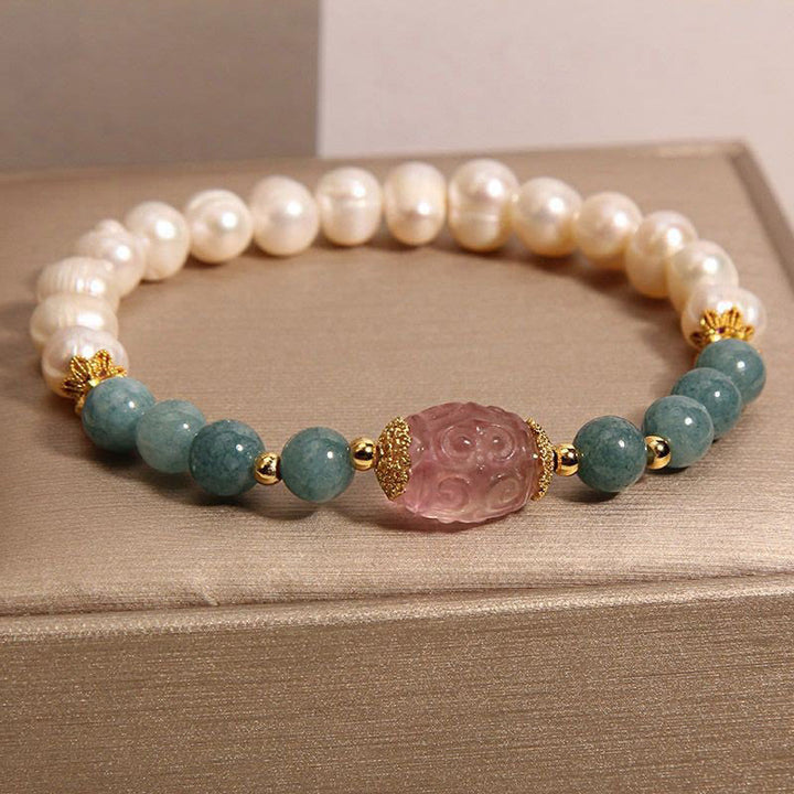 Bracciale Buddha Stones Pearl Jade Strawberry Quartz Purezza