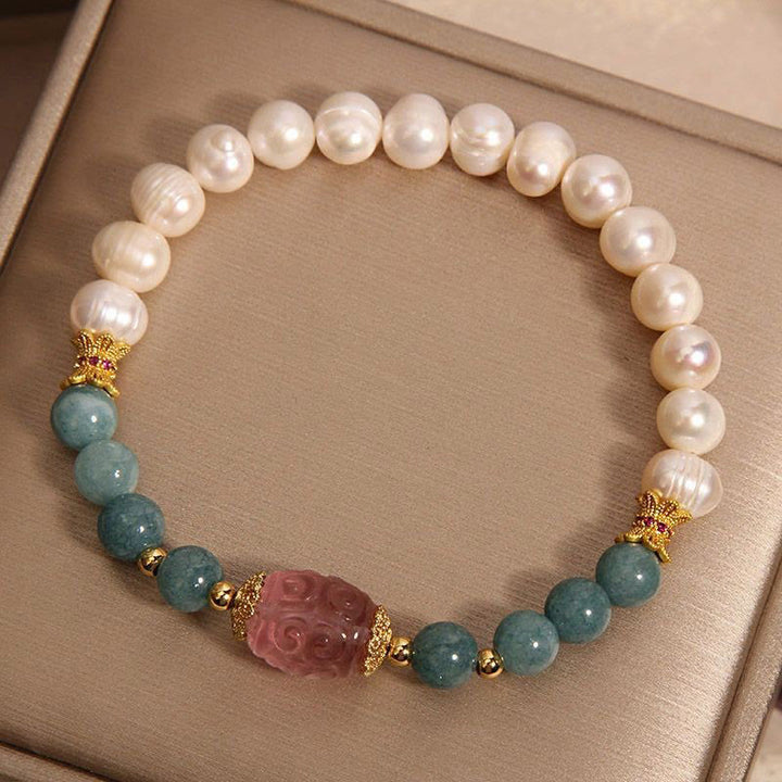 Bracciale Buddha Stones Pearl Jade Strawberry Quartz Purezza