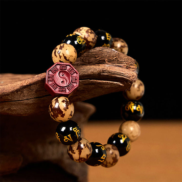 Buddha Stones Seme di Bodhi Om Mani Padme Hum Bagua Yin Yang Bracciale calmo intagliato cinabro
