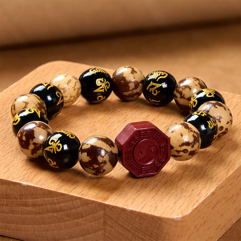 Buddha Stones Seme di Bodhi Om Mani Padme Hum Bagua Yin Yang Bracciale calmo intagliato cinabro