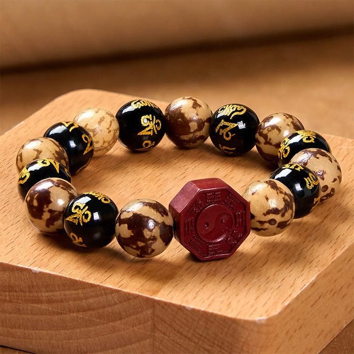 Buddha Stones Seme di Bodhi Om Mani Padme Hum Bagua Yin Yang Bracciale calmo intagliato cinabro