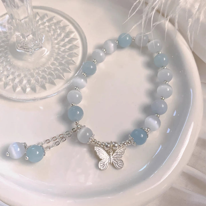 Bracciale di supporto con ciondolo a farfalla in acquamarina con occhio di gatto Buddha Stones