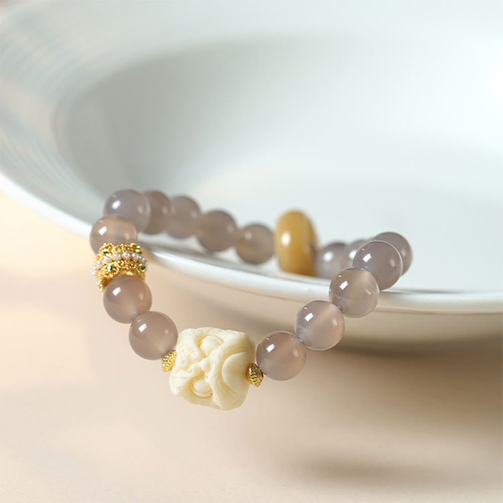 Bracciale Buddha Stones Ambra Grigio Agata Avorio Frutta Confidenza