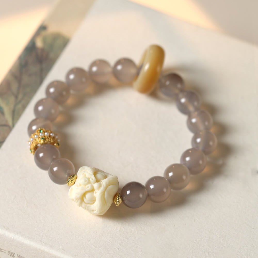 Bracciale Buddha Stones Ambra Grigio Agata Avorio Frutta Confidenza