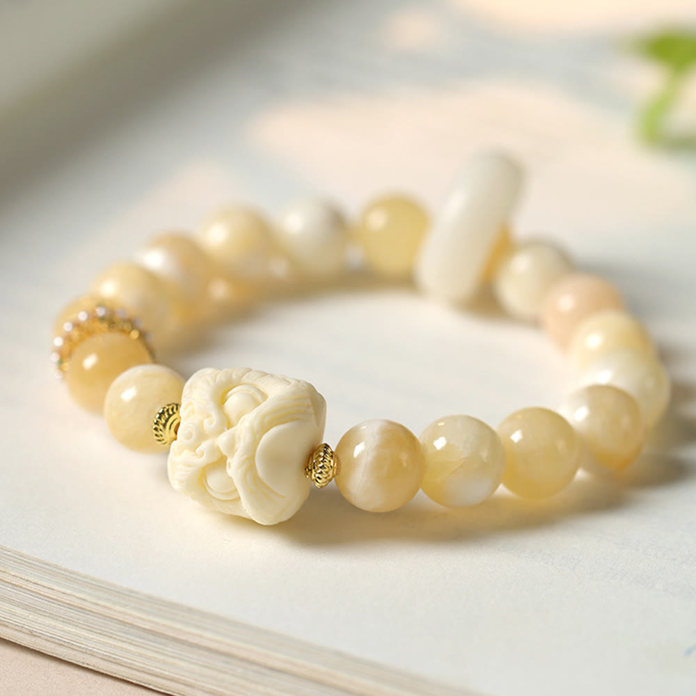 Bracciale Buddha Stones Ambra Grigio Agata Avorio Frutta Confidenza