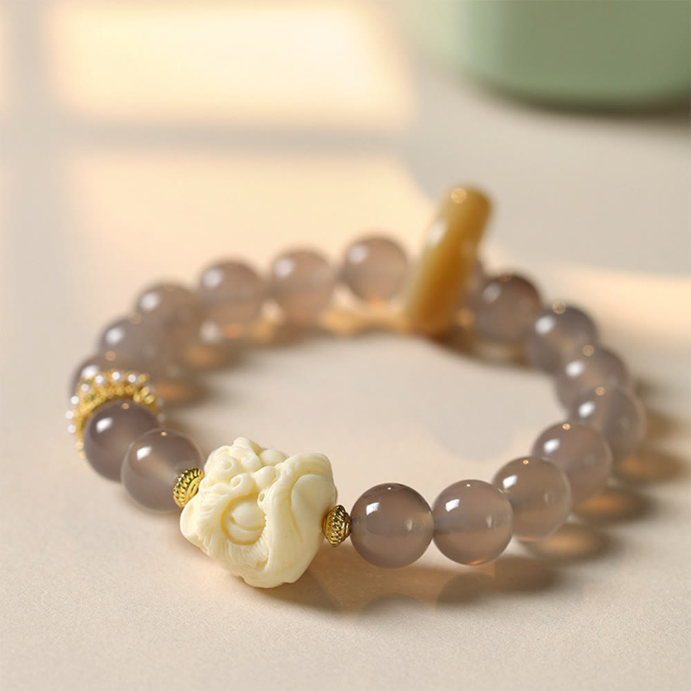 Bracciale Buddha Stones Ambra Grigio Agata Avorio Frutta Confidenza