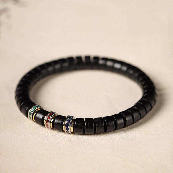 Bracciale della pace con zirconi, piccole foglie di sandalo rosso e Buddha Stones in legno di ebano