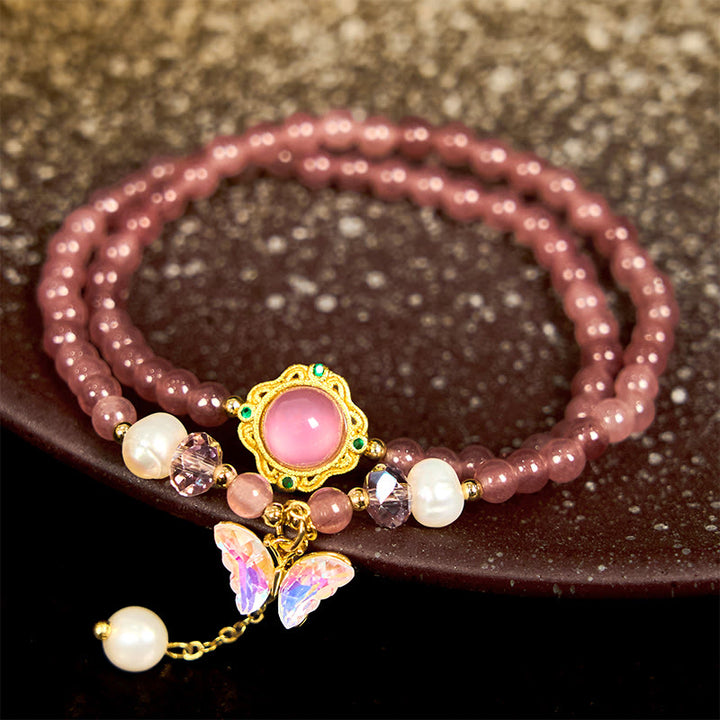 Bracciale Buddha Stones con quarzo fragola naturale, perla, farfalla, goccia d'acqua, positivo, doppio giro