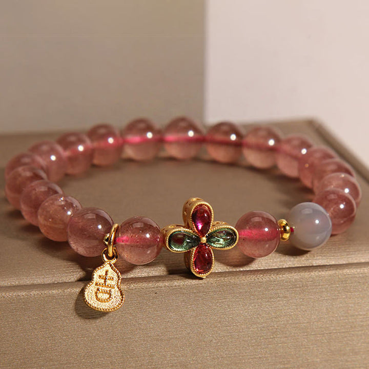 Braccialetto curativo Buddha Stones, Quarzo Fragola, Quadrifoglio, Zucca Portafortuna