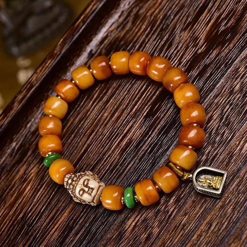 Braccialetto di protezione dalla fortuna con testa di Buddha, perline di osso di cammello tibetano naturale , Buddha Stones