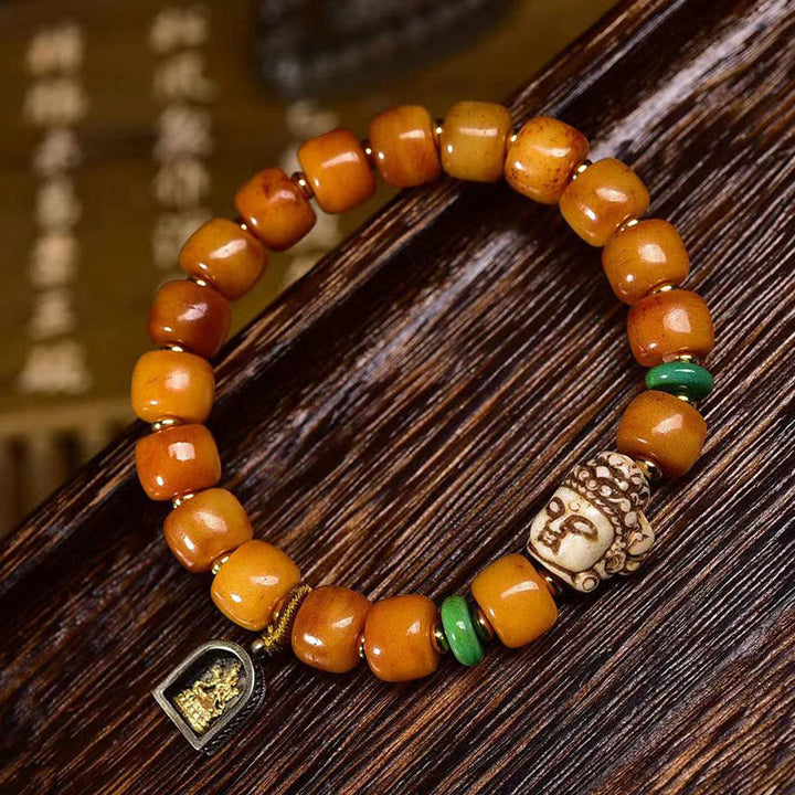 Braccialetto di protezione dalla fortuna con testa di Buddha, perline di osso di cammello tibetano naturale , Buddha Stones