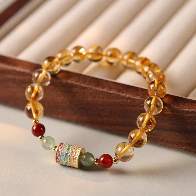 Braccialetto della creatività con ruota di preghiera colorata in citrino naturale Buddha Stones