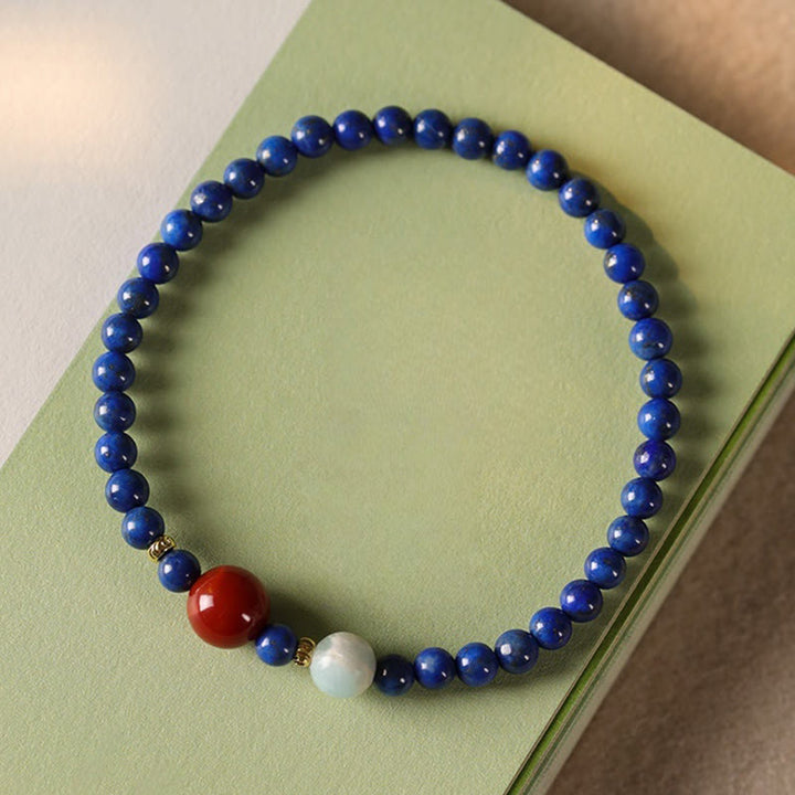 Braccialetto positivo con perle ultrasottili di agata lazurite e piccole Buddha Stones
