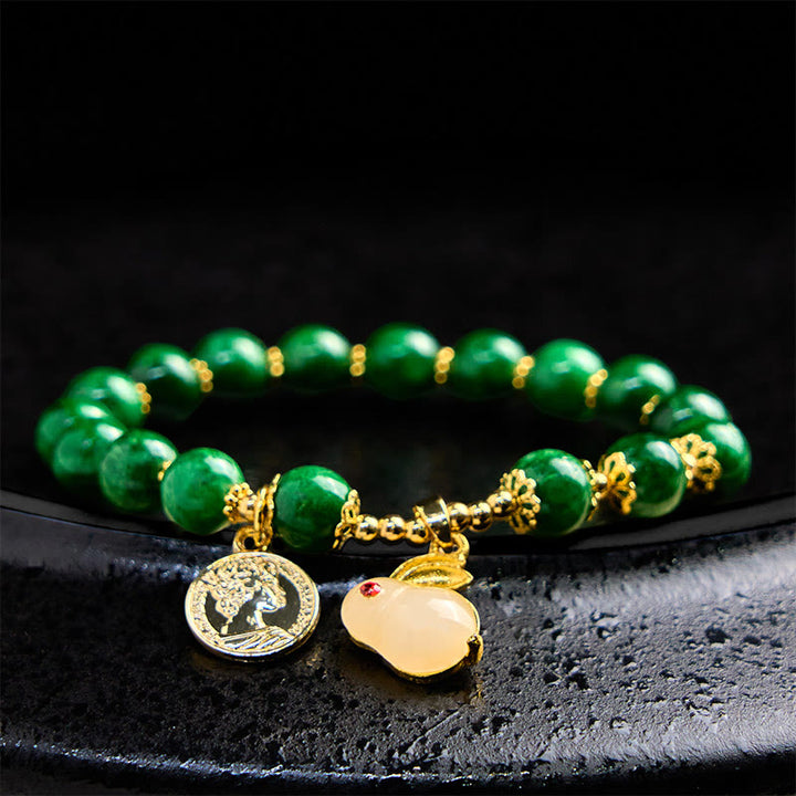 Bracciale Buddha Stones con ciondolo a forma di coniglio in calcite verde e chiarezza