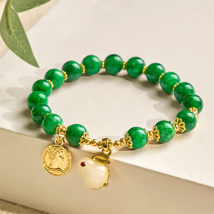 Bracciale Buddha Stones con ciondolo a forma di coniglio in calcite verde e chiarezza