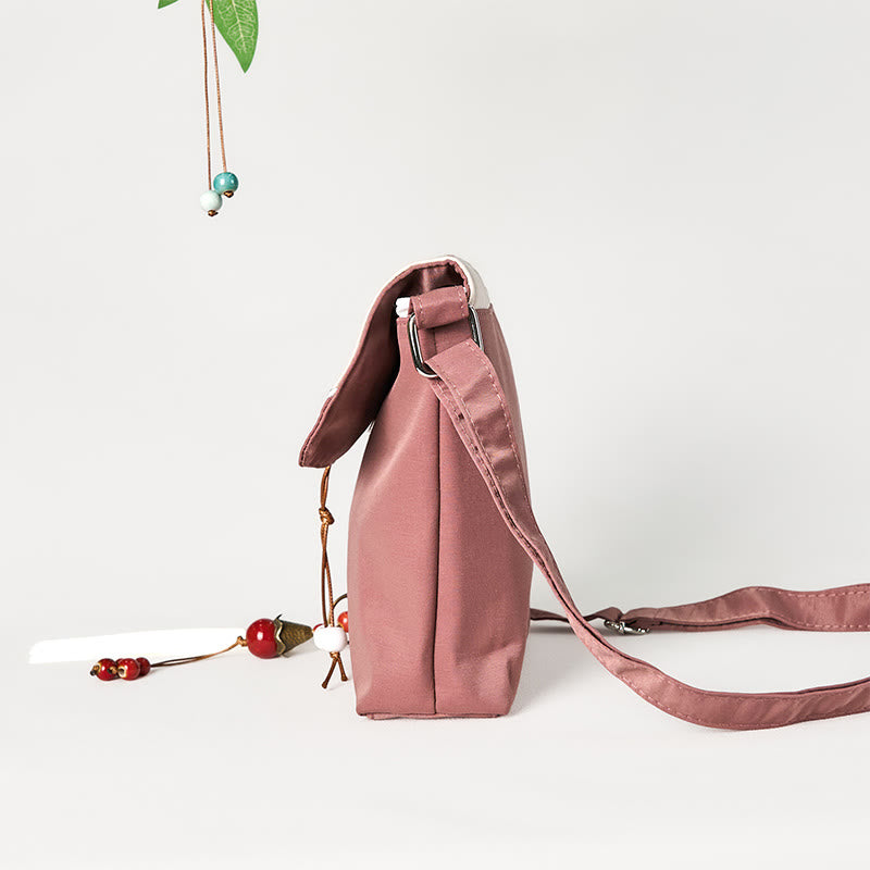 Borsa a tracolla in cotone e lino con tracolla in prugna Bossom ricamata marrone Buddha Stones