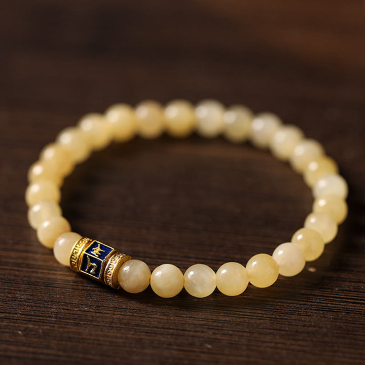 Bracciale della fortuna Buddha Stones e perle di topazio Om Mani Padme Hum