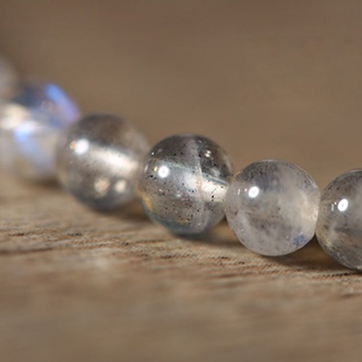 Braccialetto curativo ultrasottile Buddha Stones con pietra di luna e pesce koi