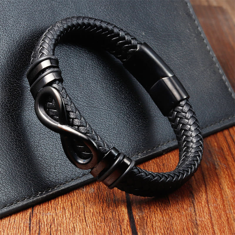 Bracciale con fibbia in pelle intrecciata rinforzata in acciaio al titanio con design a nodo infinito Buddha Stones