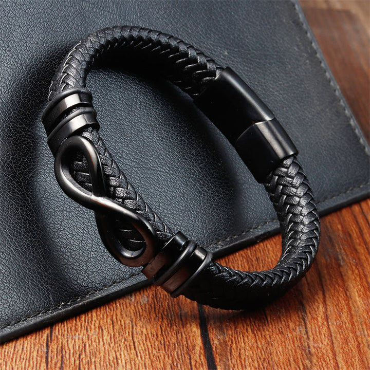 Bracciale con fibbia in pelle intrecciata rinforzata in acciaio al titanio con design a nodo infinito Buddha Stones