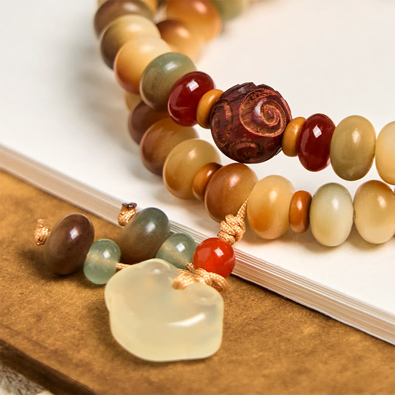 Bracciale a doppio giro con perline di abaco della saggezza, ciondolo con lucchetto della pace, semi di Bodhi colorati Buddha Stones