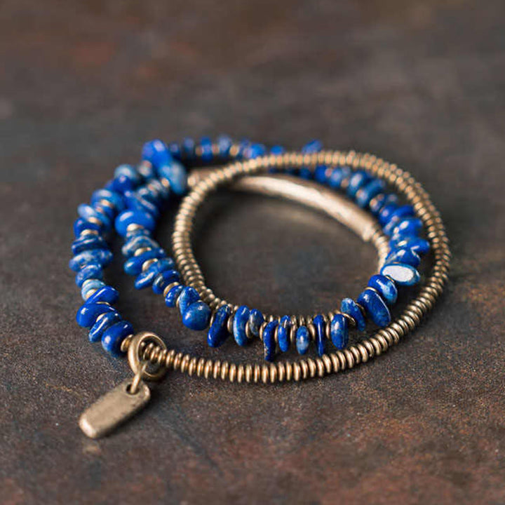 Bracciale Buddha Stones a triplo giro in lazurite con forma irregolare