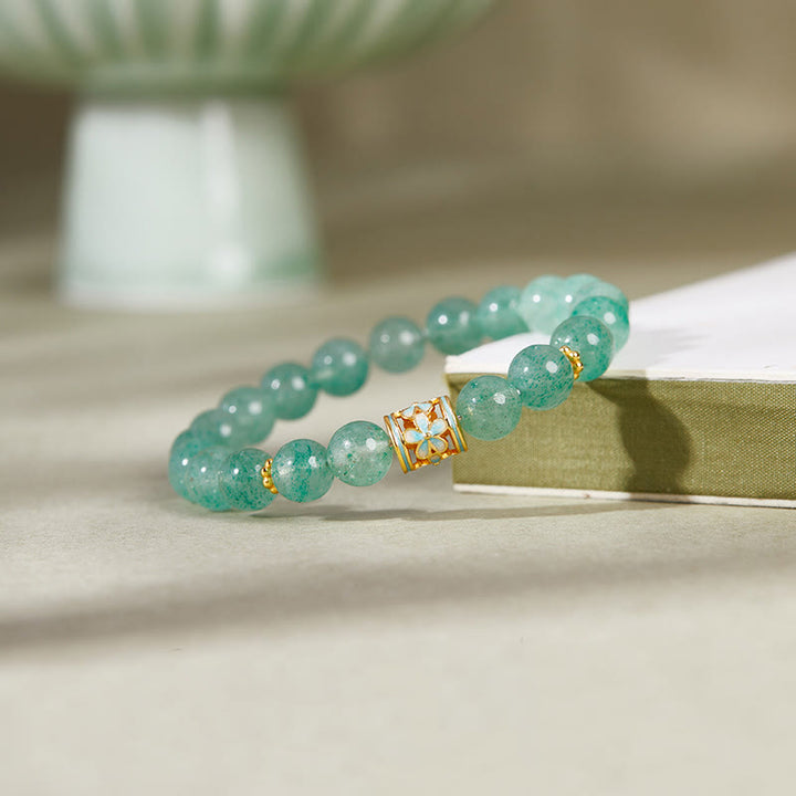 Bracciale Buddha Stones in argento sterling 925 con quarzo fragola verde e fiore calmo