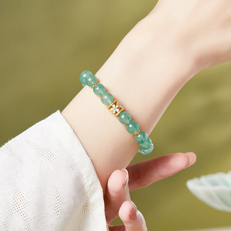 Bracciale Buddha Stones in argento sterling 925 con quarzo fragola verde e fiore calmo