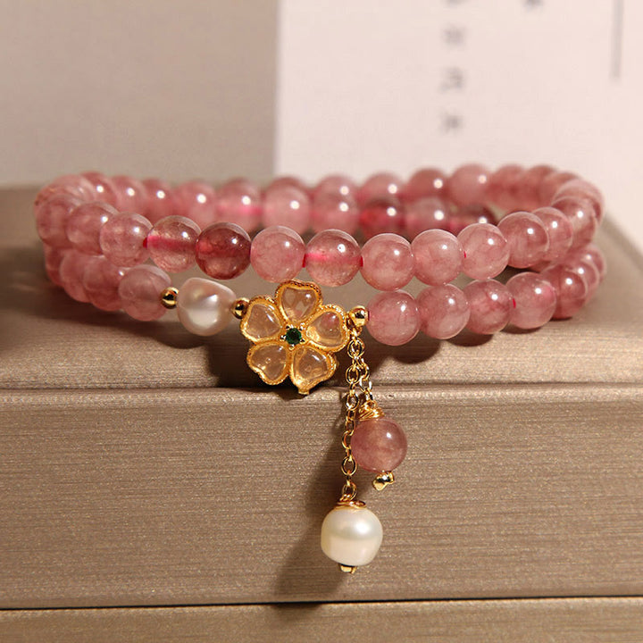 Braccialetto Buddha Stones con design positivo a doppio giro, in quarzo fragola e quadrifoglio