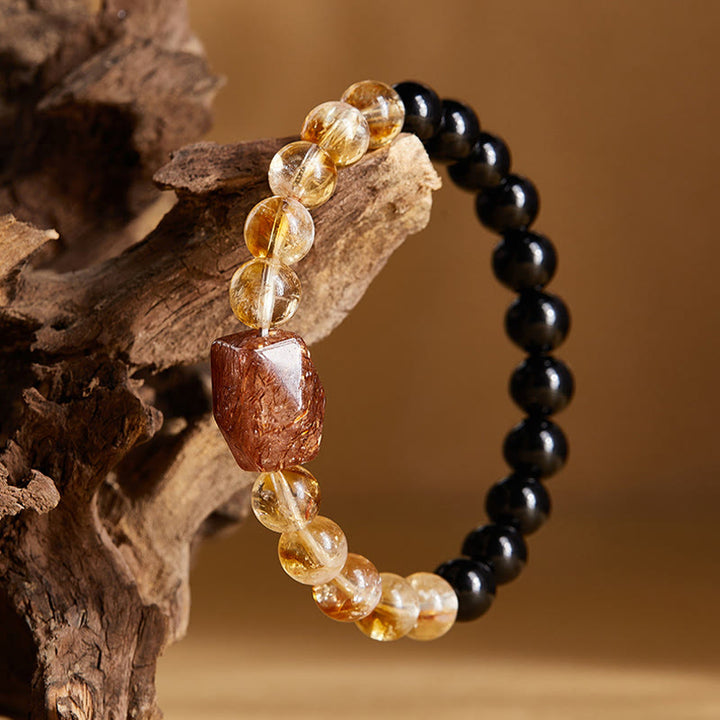 Bracciale Buddha Stones con cristalli di ossidiana nera naturale e citrino Super Seven Strength